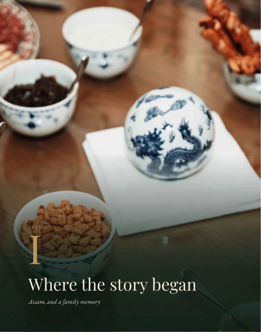 The opening page of Part I, “Where the story began”: a photograph of a table of white and blue porcelain tea bowls and tea leaves beneath the title.